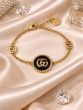 Gucci Gold and Black GG Rope-Edge Chain Bracelet